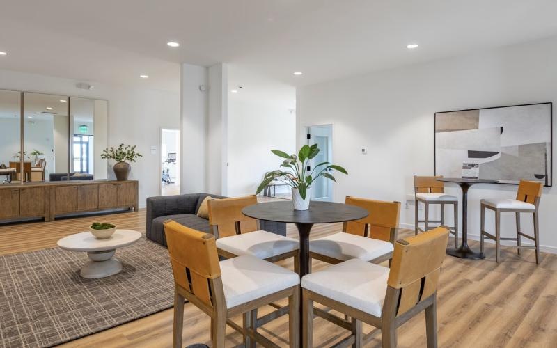 a room with a table chairs wood-style flooring at 98 Penn Place in East Pennsboro Township, PA